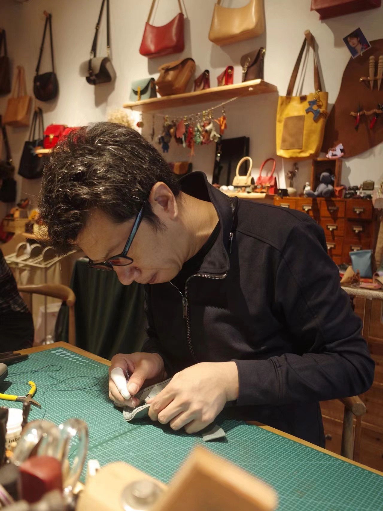 Handwork detail review for leather goods sampling